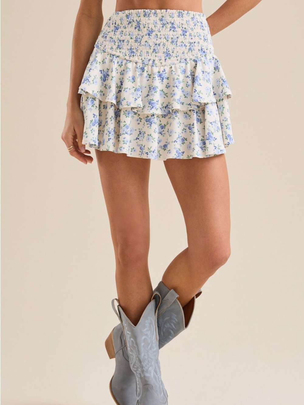 ARULA (Altar’d State) White Mini Skirt with Blue Floral Print